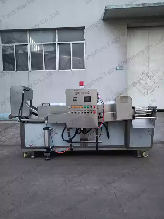 Continuous automatic frying machine
