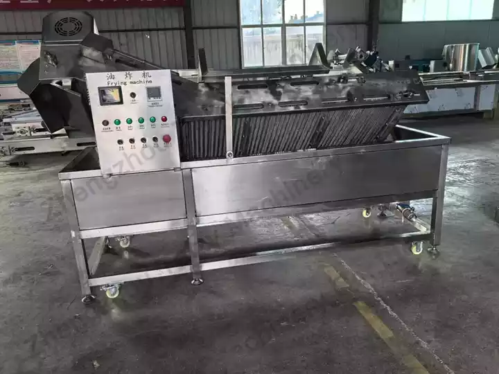 Continuous belt fryer