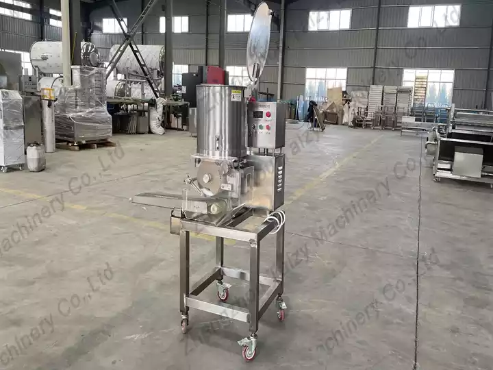 Patty forming machine for frozen food factory