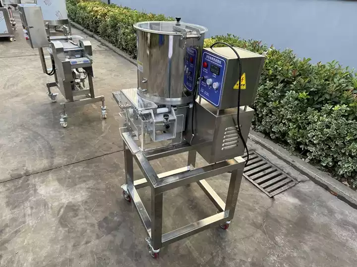 Patty shaping machine